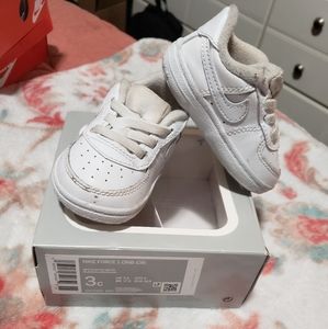 White Nike infant crib shoe